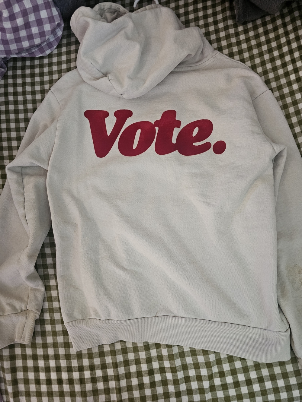 TALENTLESS Cream Hoodie with Red "Vote." Back Graphic